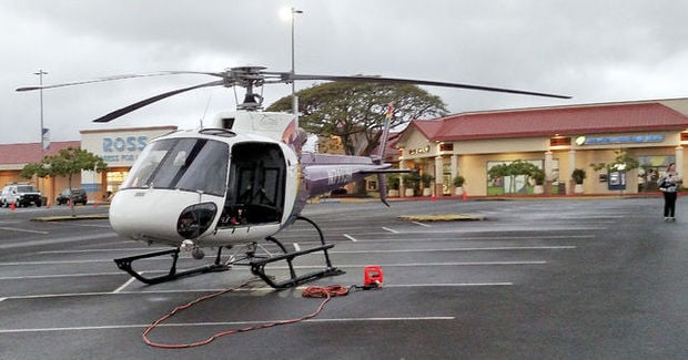 Aerial crane moves quickly in Hawaii