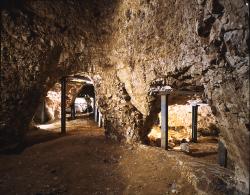 Visitors can experience life underground as a Neolithic flint miner at Grimes Graves in Norfolk.