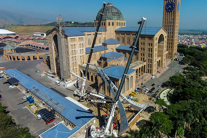 Liebherr mobile cranes installing bell tower at Basilica in Brazil