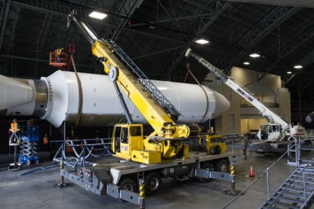 Maxim Crane executes tandem lift and sets Titan IVB Rocket @ National Musem of the USAF
