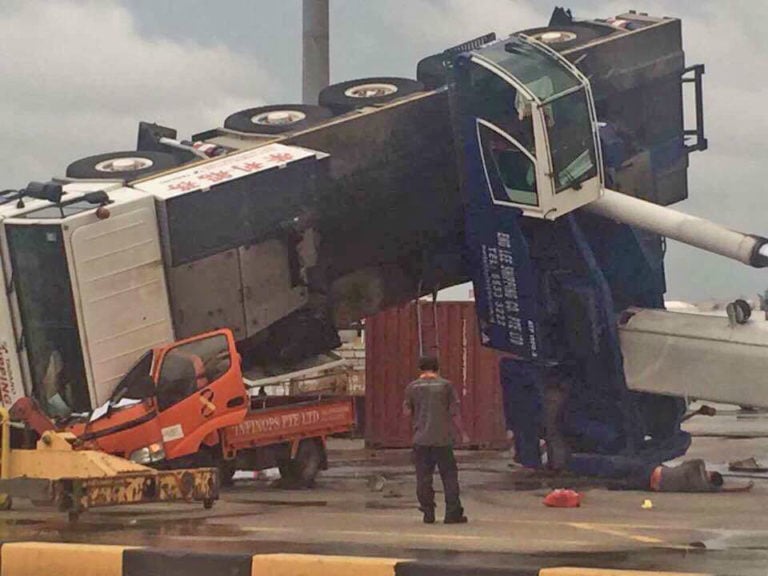 Two injured after mobile hyraulic truck crane tips over at Jurong Port