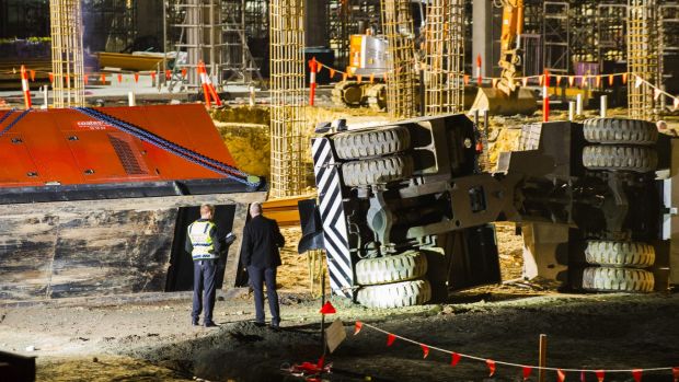 Worker dies at University of Canberra hospital work site when Pick & Carry crane tips over