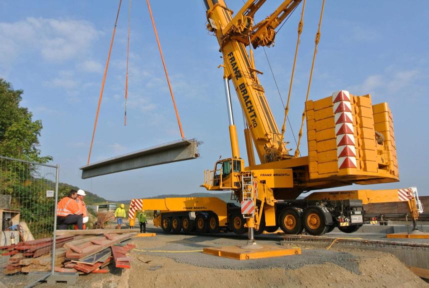 Franz Bracht 700-ton All Terrain Crane sets 60-ton bridge segments in Baunatal, Germany