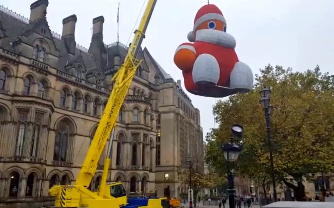 Santa Claus is back in Manchester City, UK as John Sutch Cranes hoists a 6-ton St. Nick in this Video