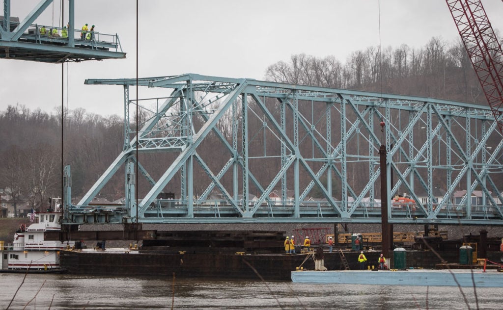 Pictures of Brayman Construction lowering a 375' center section of the ...