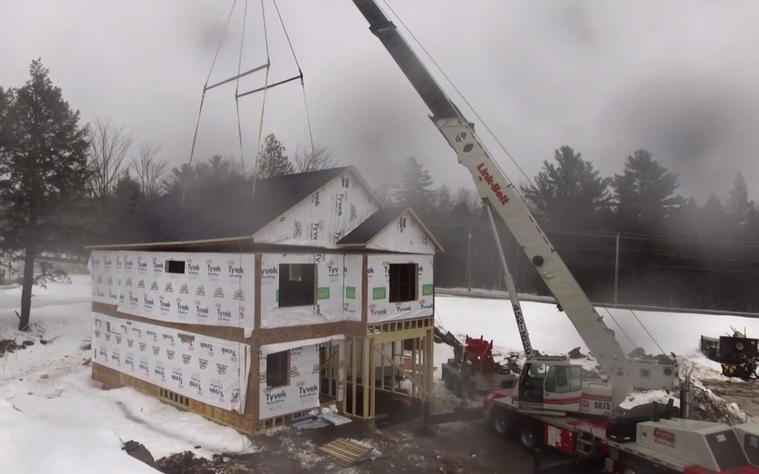Watch Video as Capital Crane Rentals Ltd sets a framed roof with a Link-Belt truck crane