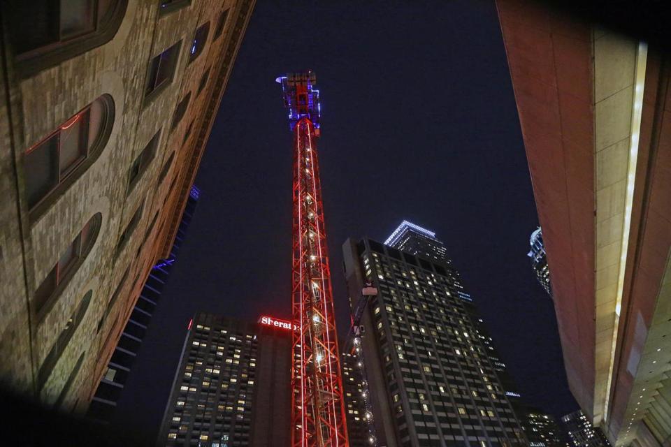 A glowing tower crane becomes instant landmark in downtown Boston