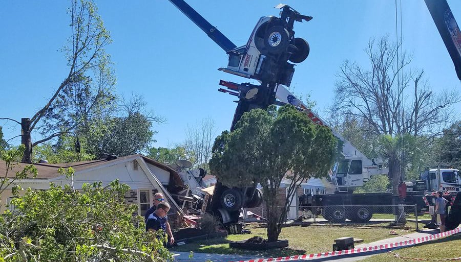 32-ton boom truck crane tips and hit two homes in Jacksonville, FL during tree removal