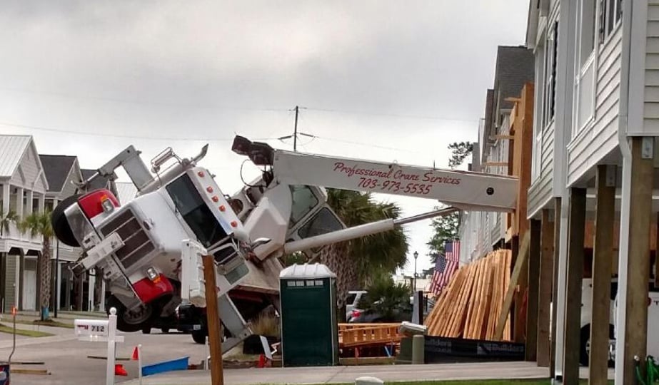 Boomtruck crane tips over in Myrtle Beach, no reported injuries.
