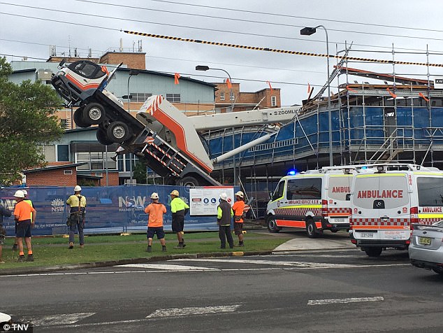 Zoomlion Truck Crane tips over on construction site in Australia injuring one worker