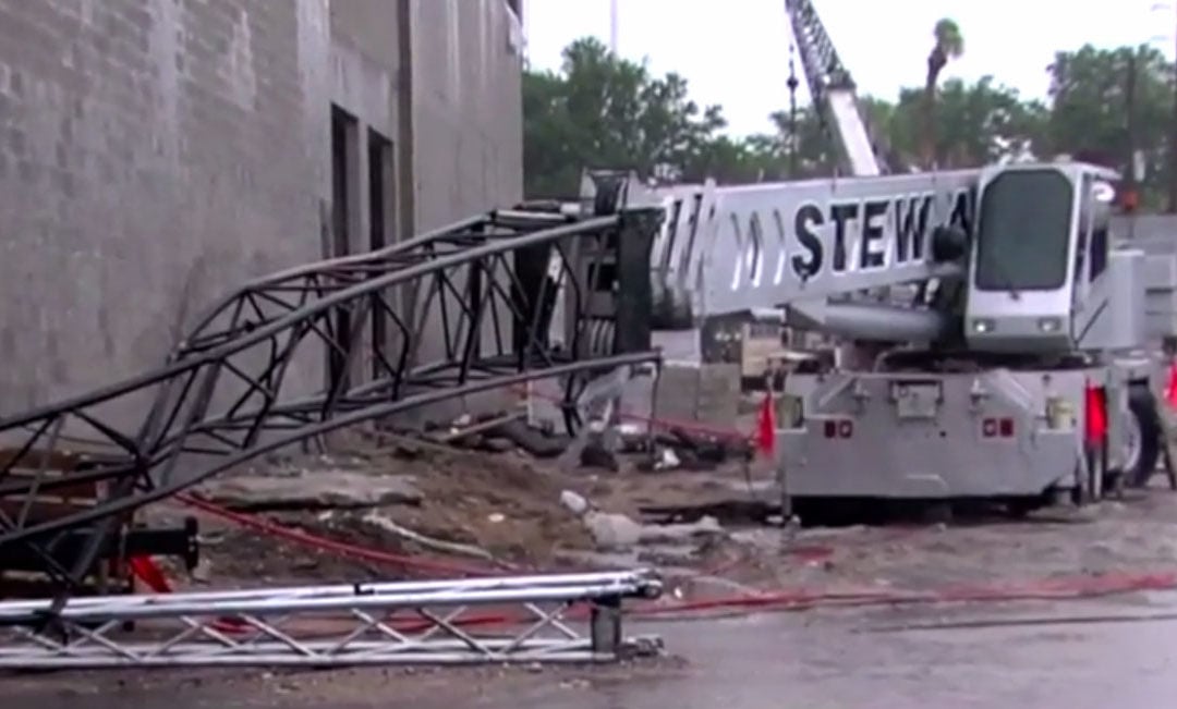A Stewart Crane Inc operated Link-Belt truck crane jib section buckles in Florida