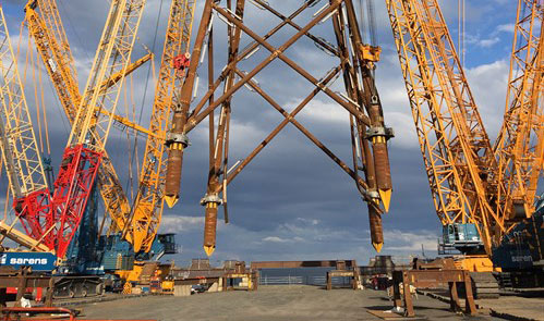Sarens Transports and lifts offshore jacket cluster in UK with Demag and Liebherr Cranes