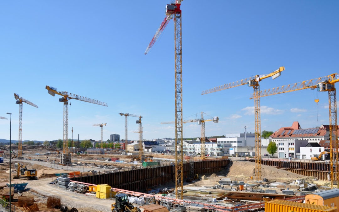 Huge fleet of Potain tower cranes erecting blockbuster residental project in Regensburg, Germany