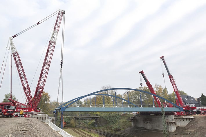 Riga-Mainz hoists 418-ton Bridge with two Liebherr All Terrain and 1 Lattice Boom Crawler Crane