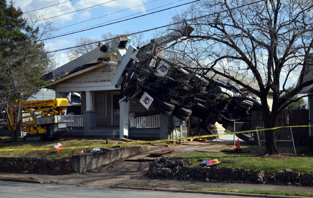 Chattanooga Tree Service Boom Truck topples over last Friday